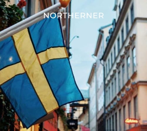 Flag of Sweden against background of a street, celebrating Sweden's smoke-free status