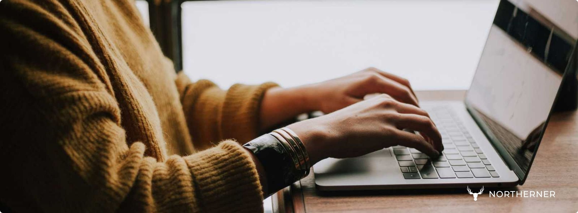Person working on laptop, symbolising nicotine's effects on concentration