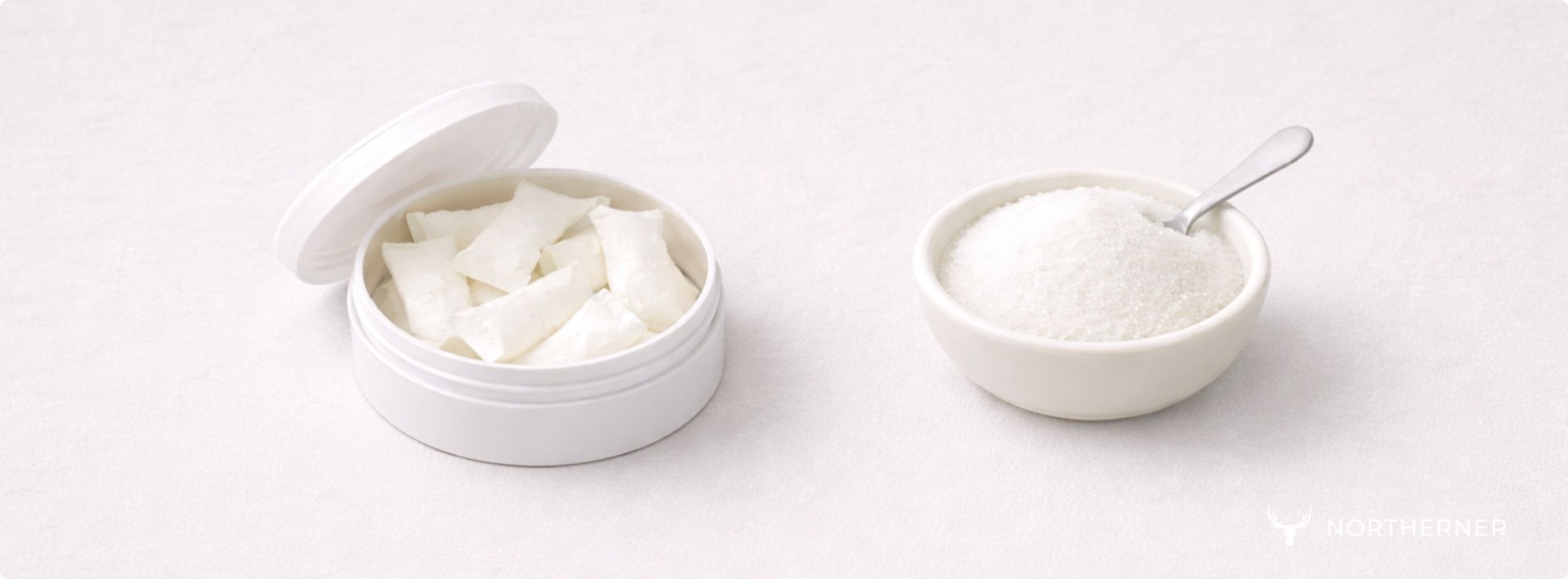 nicotine pouch can and bowl of sugar
